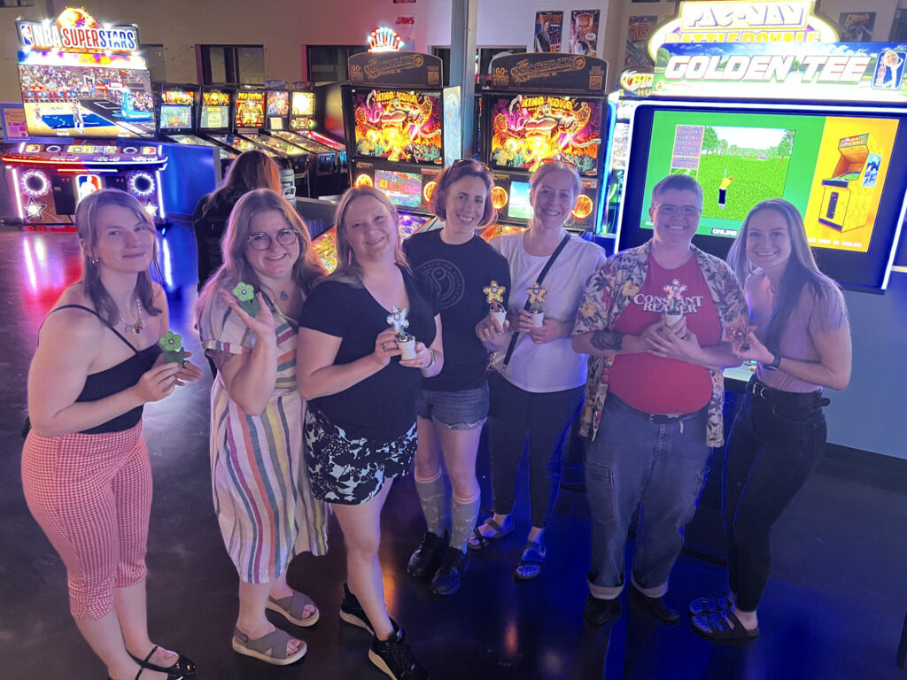 The winners holding prizes