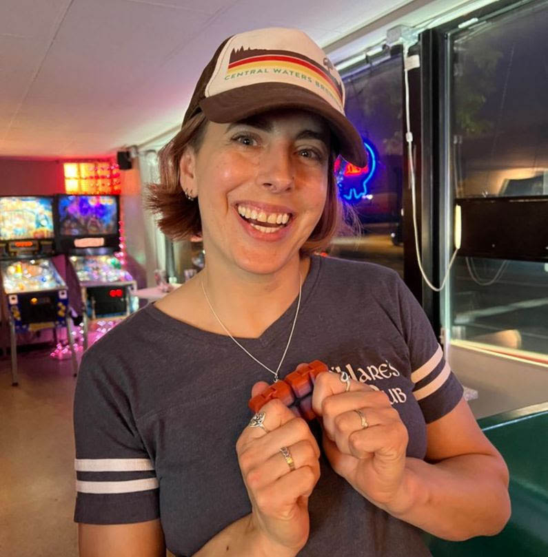 Jacque holding her winnings