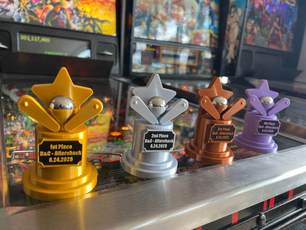 The trophies on top of Attack from Mars pinball