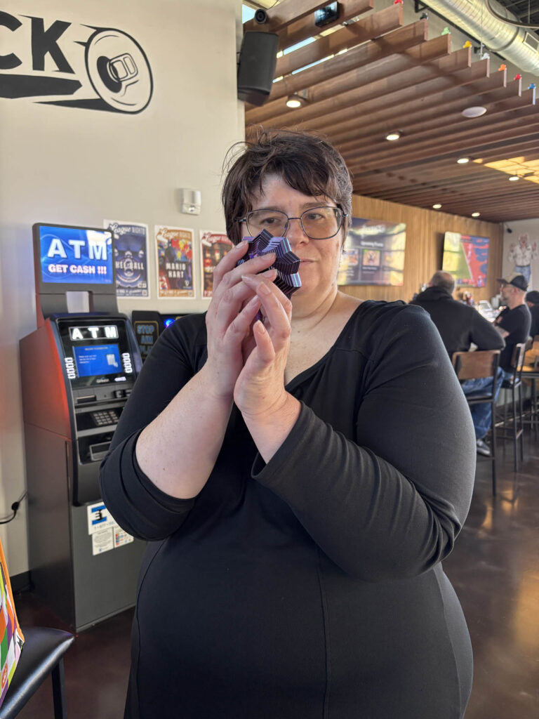 Amber holding her fidget toy she just won