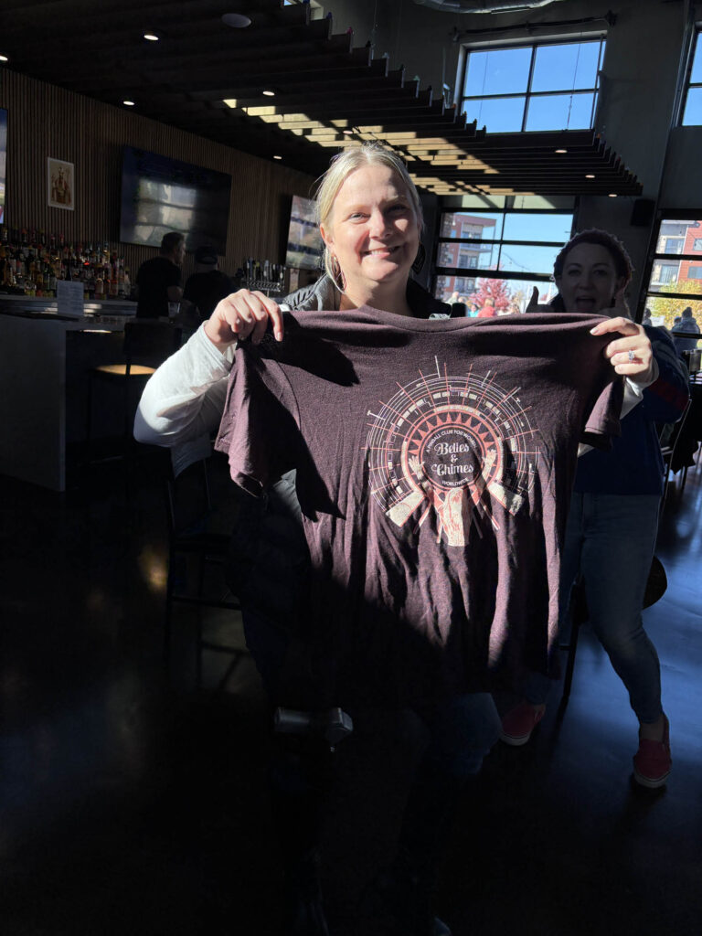 donelle holding a shirt she won