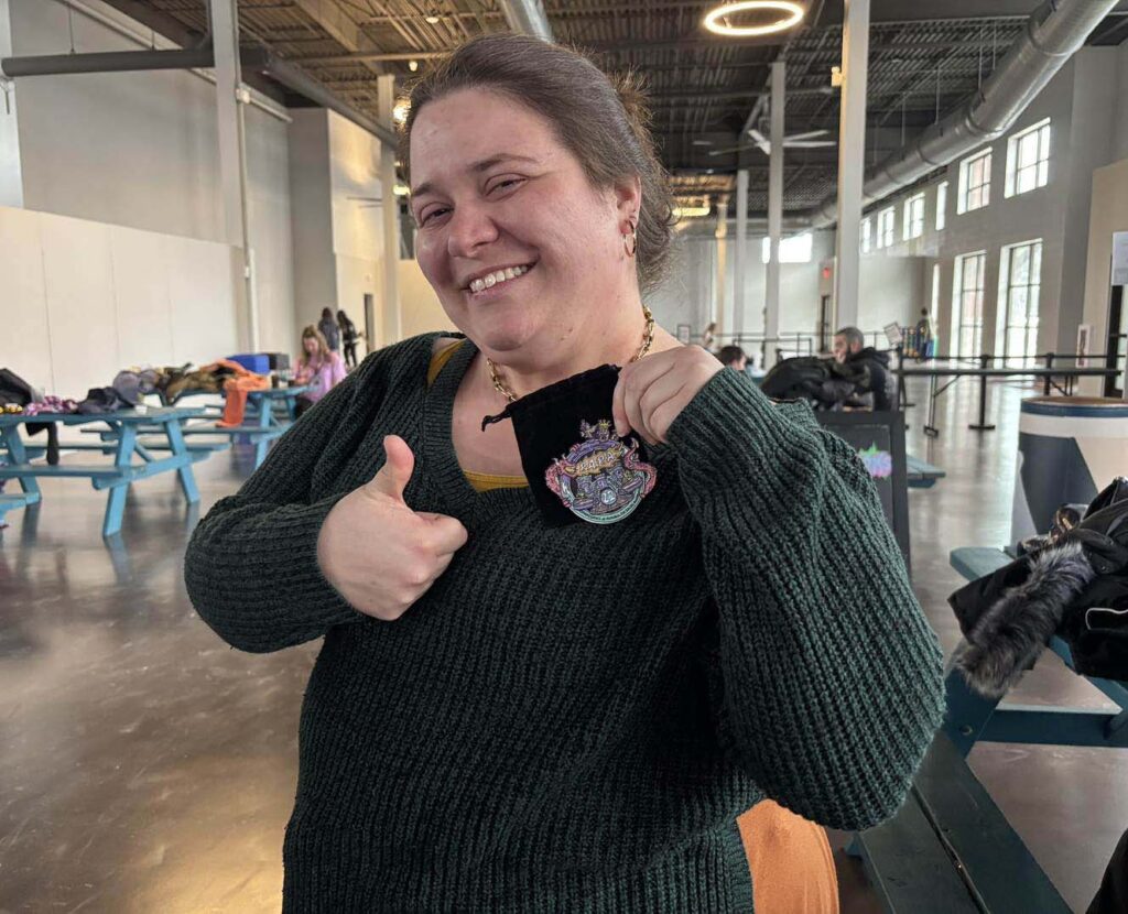 Mackenzie holding her winnings