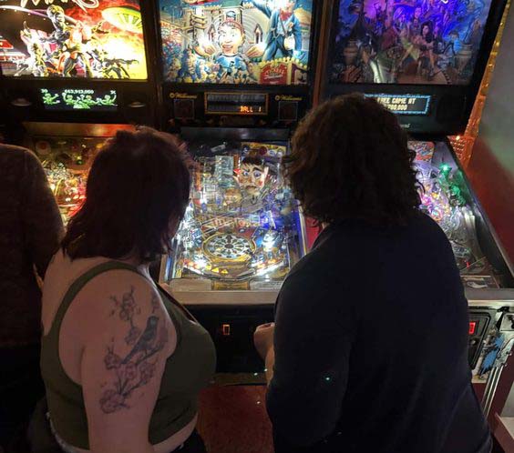 ladies playing pinball